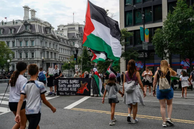 Protesters hold up Palestinian flags near the White House in Washington, D.C., U.S., July 28, 2026